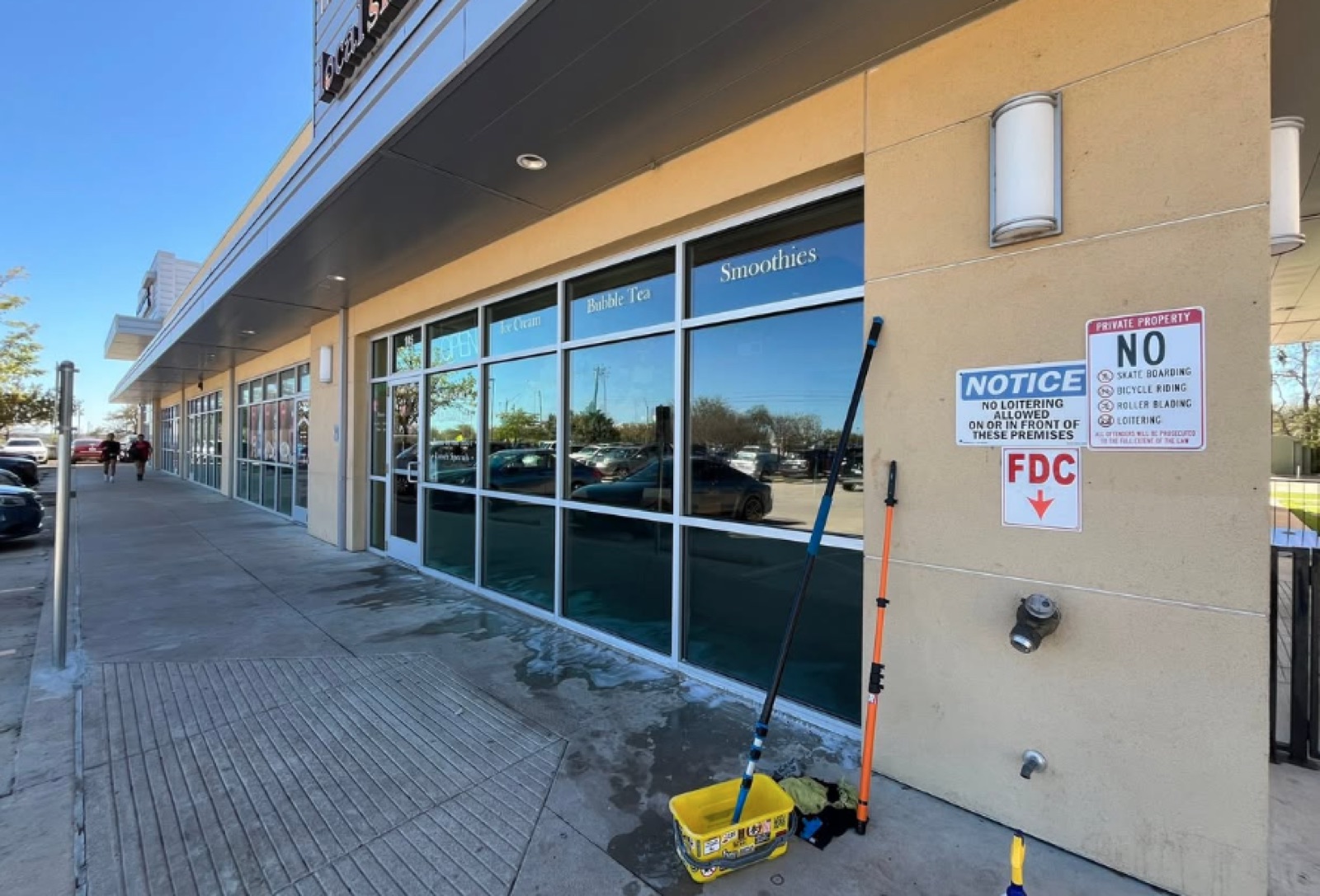 Retail strip-center storefront windows cleaned